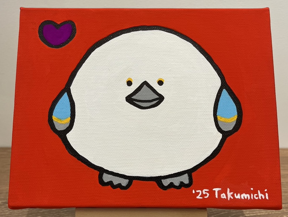 見つめるシマエナガ